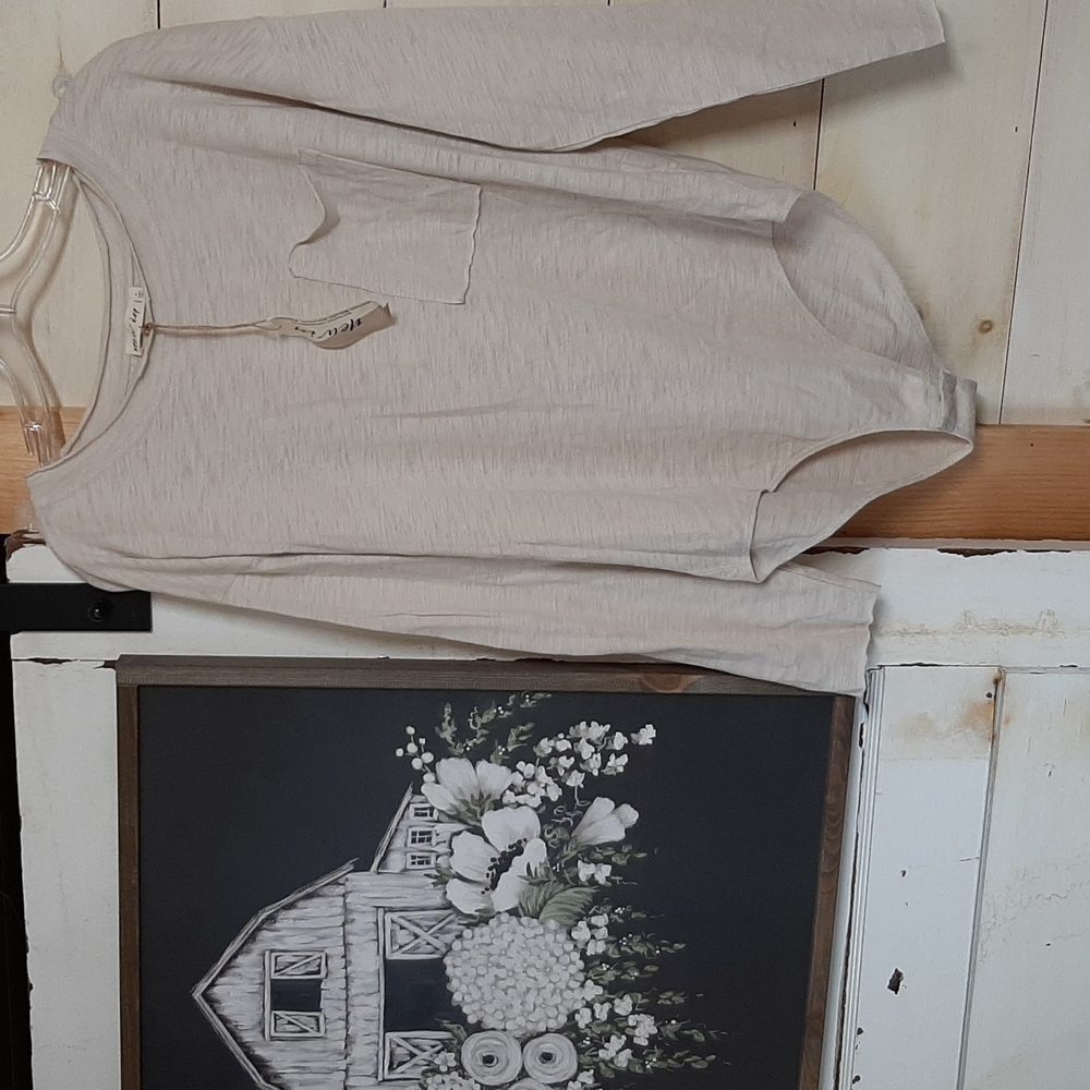 New in bodysuit size L coconut milk